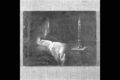 figura di donna seduta che legge