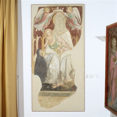 Madonna con Bambino in trono incoronata da due angeli, donatrice e uomo in catene