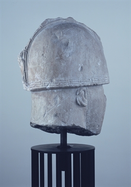 Testa di guerriero in pietra da Numana