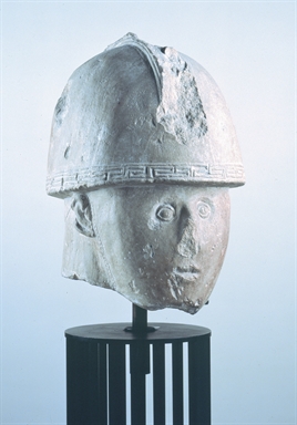 Testa di guerriero in pietra da Numana