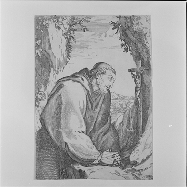 San Francesco d'Assisi contempla il Crocifisso