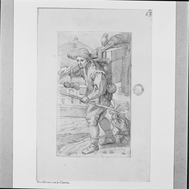 Arte per via: cacciatore di uccelli con civetta