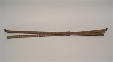 ferro ferma-tessuto al telaio