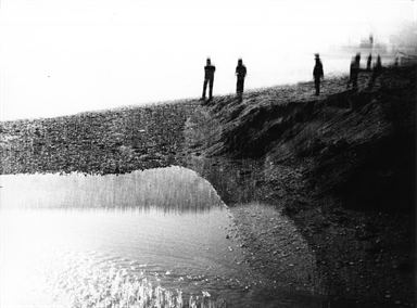 ombre tra acqua e sabbia