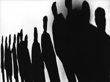 ombre di uomini sul muro