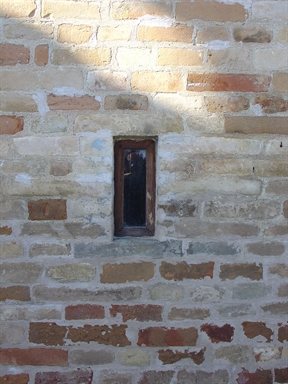 Casa con feritoia