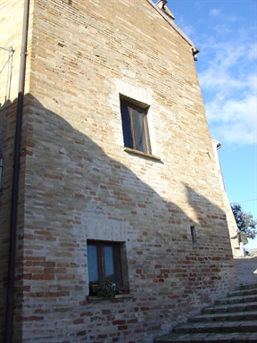 Casa con feritoia