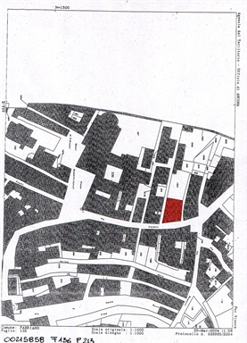 Palazzo con volto in Via Cialdini, 104